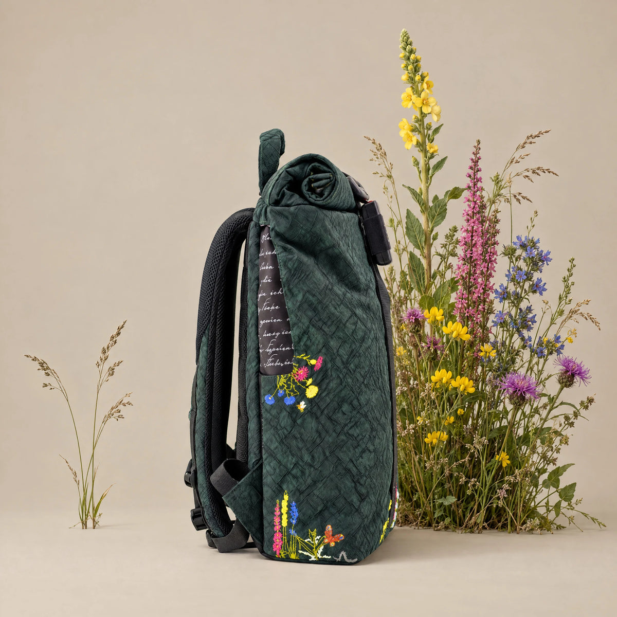 Robinga Rolltop Auflage 2, Seitenansicht mit Flaschenfach und Aufdruck